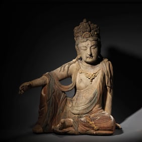 A Wood Carved Seated Guanyin Statue