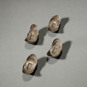 A Set of Four Silver Ingots