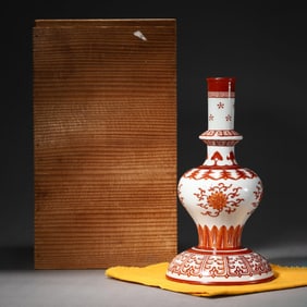 An Iron Red Enamel Vase with Baoxianghua Motif