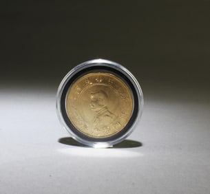 A Gold Plated Chinese Numismatic Charm