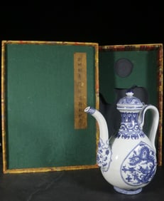 A Blue and White Ewer With Dragon Motif