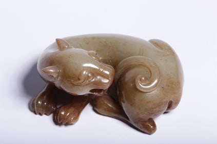 A Yellow Jade Beast Ornament