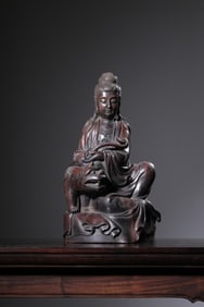 A Zitan Wood Guanyin Seated Statue