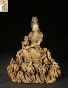 A Shoushan Stone Guanyin Seated Ornament With Ruyi Motif