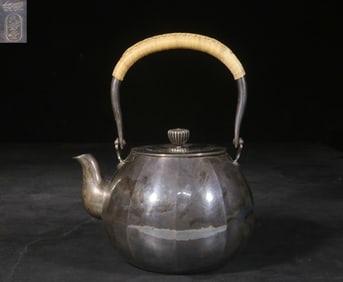 A Silver Teapot With Handle Attributed to Kyuhodo