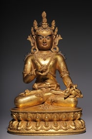 A Gilt Bronze Yellow Jambhala Statue