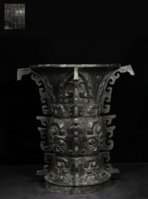 A Bronze Vase With Beast Motif