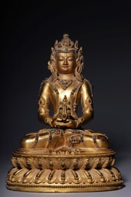 A Gilt Bronze Longevity Buddha Seated Statue With Inlaid Gems