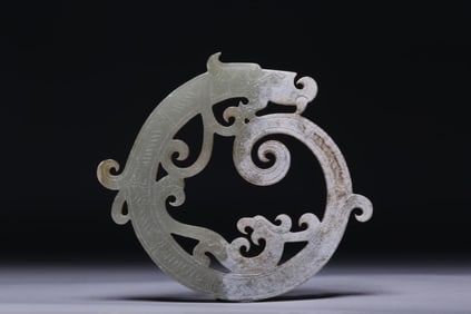 A Jade Circular Pendant With Dragon Motif