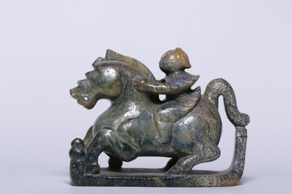 A Jade Ornament With Horse and Rider Motif