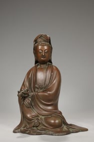A Bronze Guanyin Ornament Holding Scripture