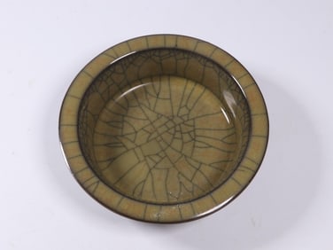 A Ge Ware Charger With Folded Rim