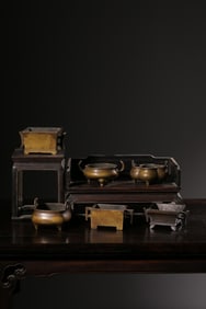 A BRONZE SET OF SIX CENSERS