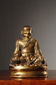 A Gilt Bronze Lama Statue