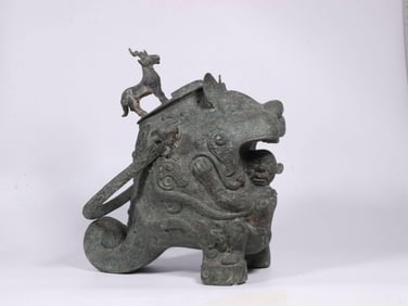 A Bronze You with Tiger Devouring Man Motif
