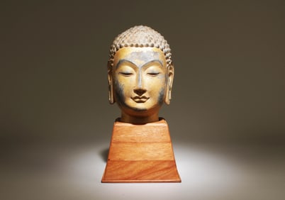 A Chinese Buddha Head with Stand