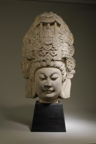 A Stone Buddha Head with Stand