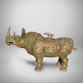 A Bronze Rhino Statue with Silver Lining