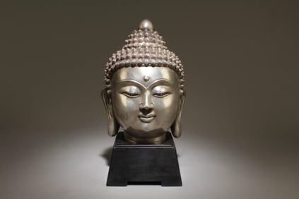 A Bronze Buddha Head with Stand