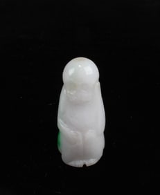 A Carved Jade Pendant