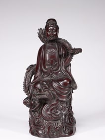 A Zitan Wood Guanyin Statue Riding a Dragon