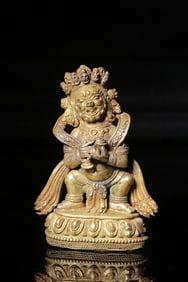 A Gilt Bronze Tibetan Protector Deity Statue