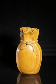 A Yellow Glazed Vase with Incised Phoenix Motif