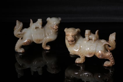 A Pair of Hetian Jade Mother and Child Auspicious Beast Ornaments