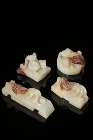A Set of Four Hetian Jade Sword Fittings with Chi Dragon Motif
