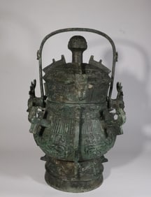 A Bronze You Vessel with Phoenix Motif