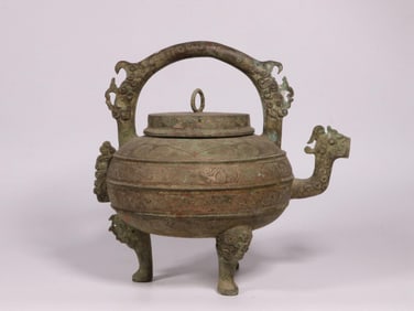 A Bronze He Vessel with Beast Head and Chi Dragon Motif
