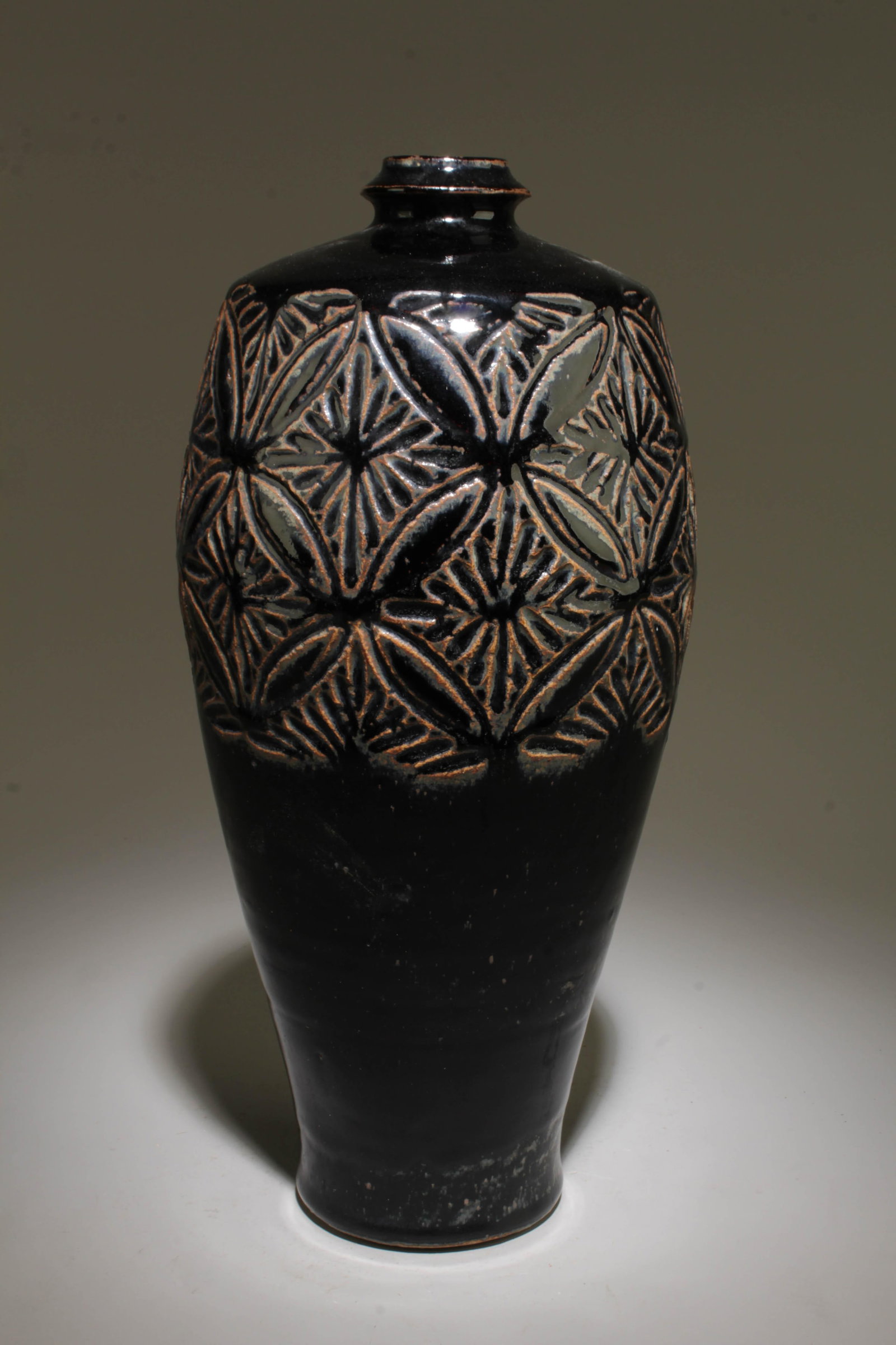 A Pottery Vase: A Pottery Vase. Dimension: 5.5" x 12.5".