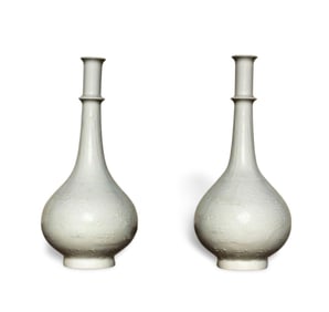 A Pair of White Glazed Vases