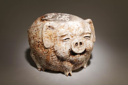 An Pottery Pig Ornament