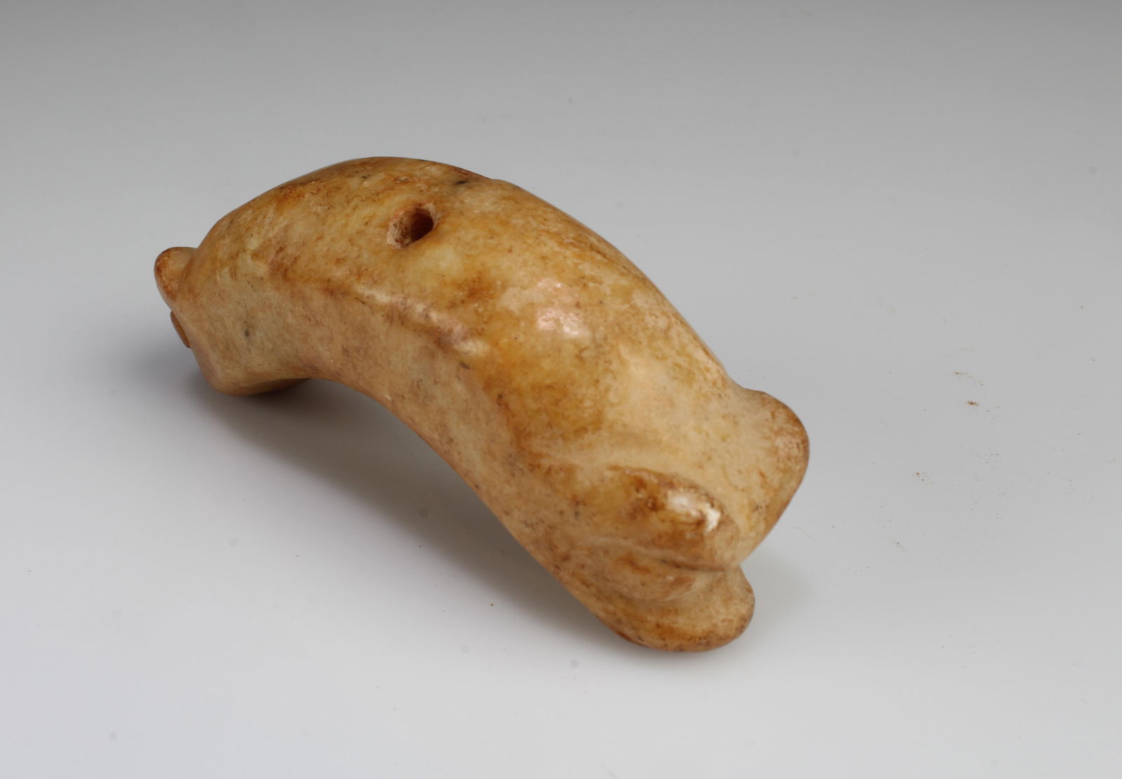 A Carved Jade Ornament: A Carved Jade Ornament. Length: 3"