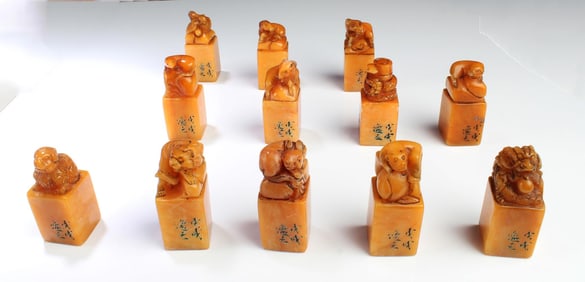 A set of Twelve Soapstone Seals