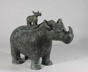 A Bronze Rhinoceros Zun with Inscriptions