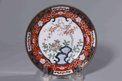 A Blue and White Plate with Floral Motif and Bronze Rim