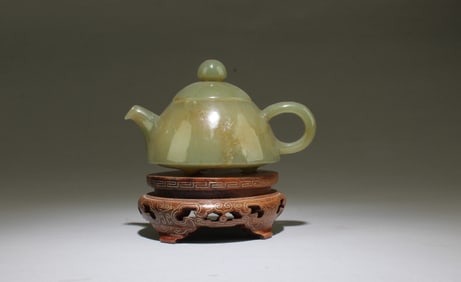 A Carved Jade Teapot