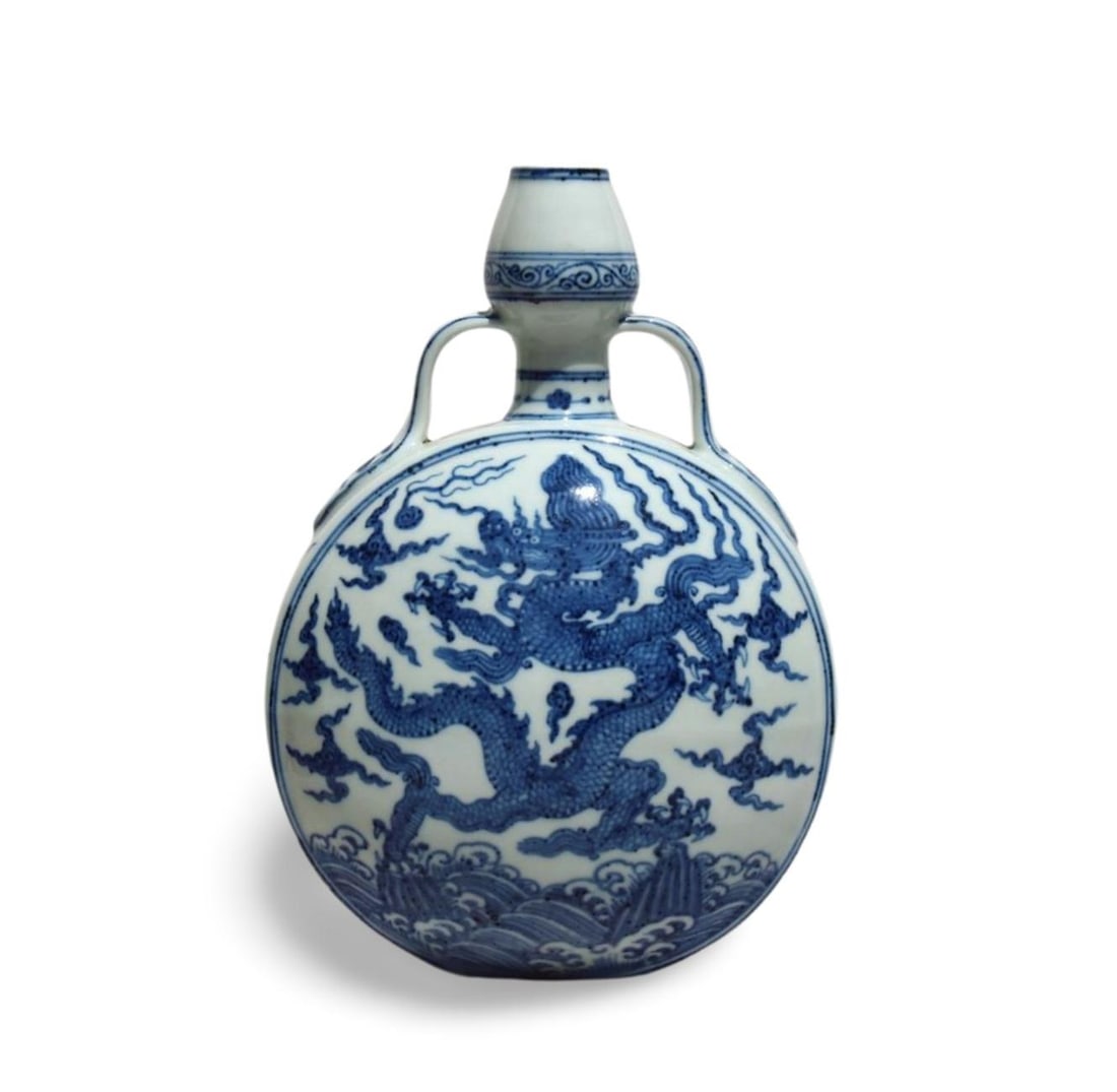 A Blue and White Moonflask Vase: A Blue and White Moonflask Vase. Dimension: 8.5" x 12.1".