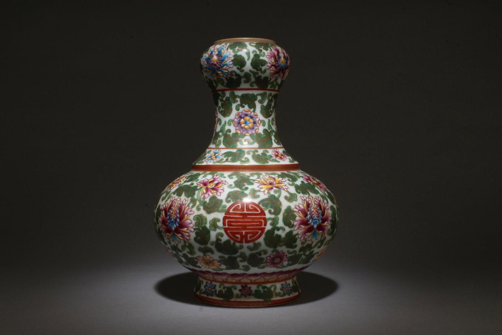 A Fencai Garlic Head Vase: A Fencai Garlic Head Vase. Dimensions: 11.5" x 8".