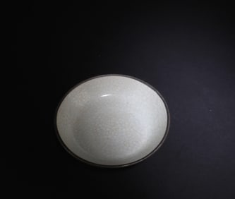 A Ru Ware Plate, with silver rim