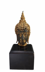 A Gilt Bronze Buddha Head