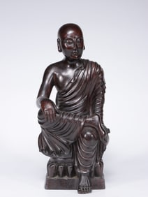 A Zitan Wood Seated Ksitigarbha Statue