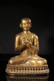 A Gilt Bronze Tibetan Buddhist Monk Statue