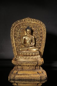 A Gilt Bronze Seated Shakyamuni Buddha Statue