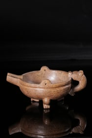 A Hetian Jade Yi Vessel