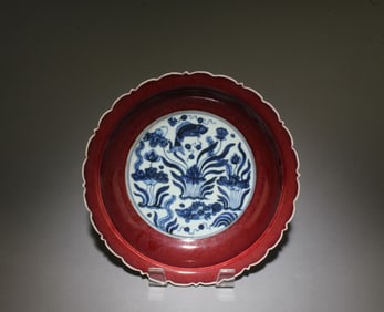 A Blue, White, and Red Fish Plate