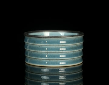 A Round Porcelain Holder