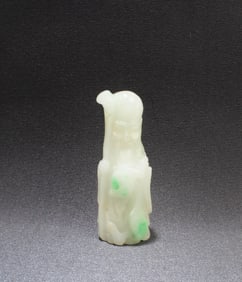 An Carved Jadeite Jade 'Shou Xing Gong' Figurine